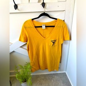 PINK gold WVU shirt. Size large